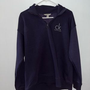 purple Calvin Klein quarter zip sweater